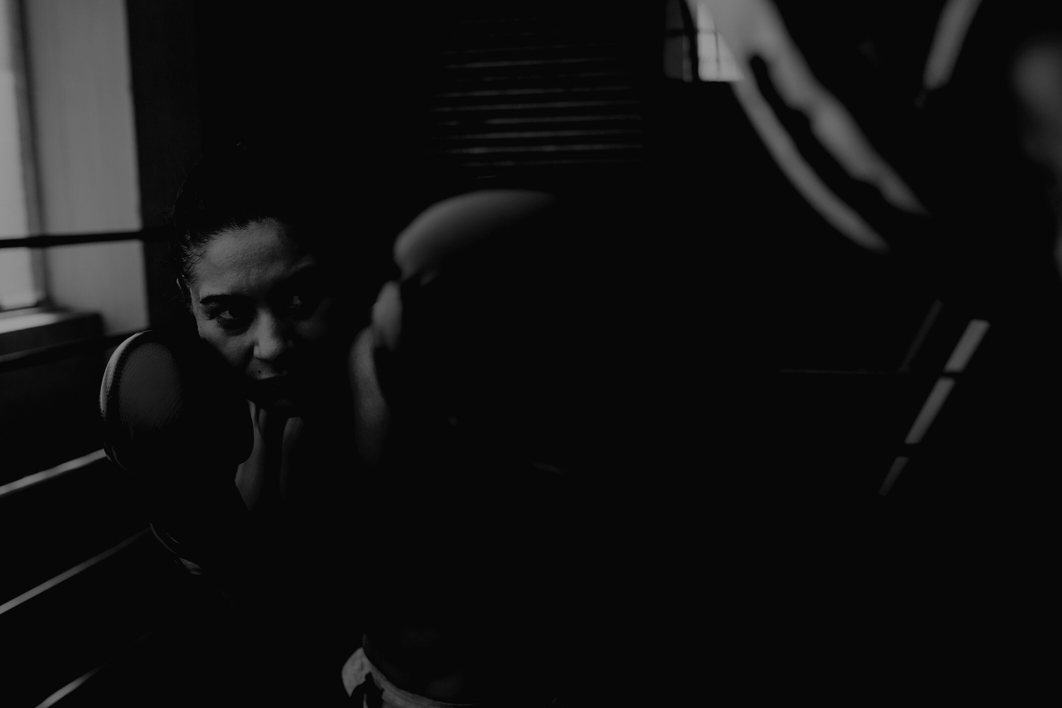 Female Boxer Training inside a Boxing Ring